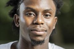 Young black male headshot informal